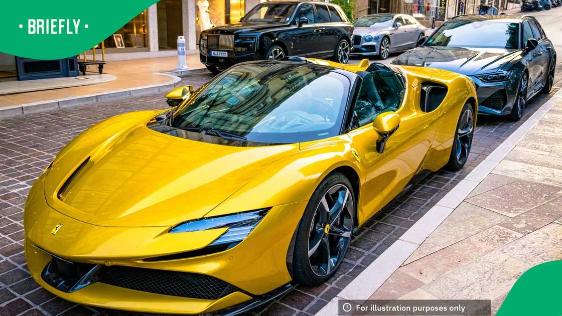 Ferrari SF90 Spider (Type F173) hybrid sports car parked on the street in front of Hotel Hermitage in Monte Carlo Ferrari SF90 Spider (Type F173) hybrid sports car parked on the street in front of Hotel Hermitage in Monte Carlo