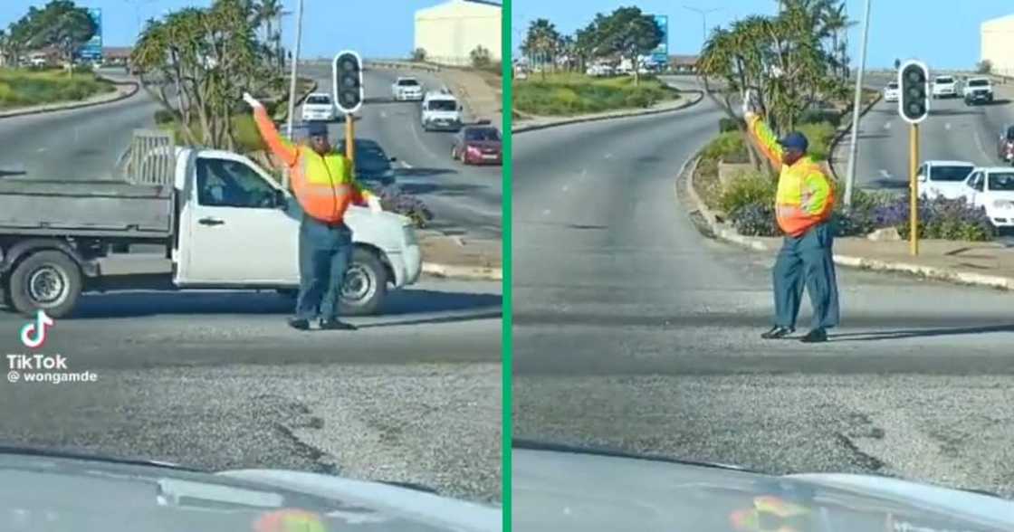 Traffic conductor at a busy intersection