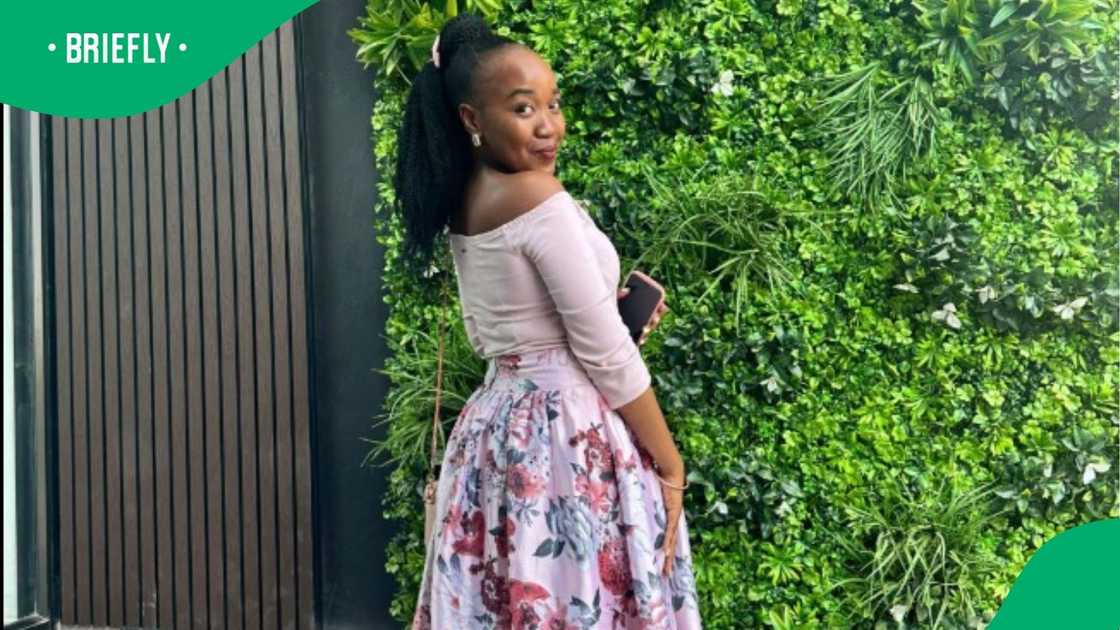 Woman in corporate still lives in township