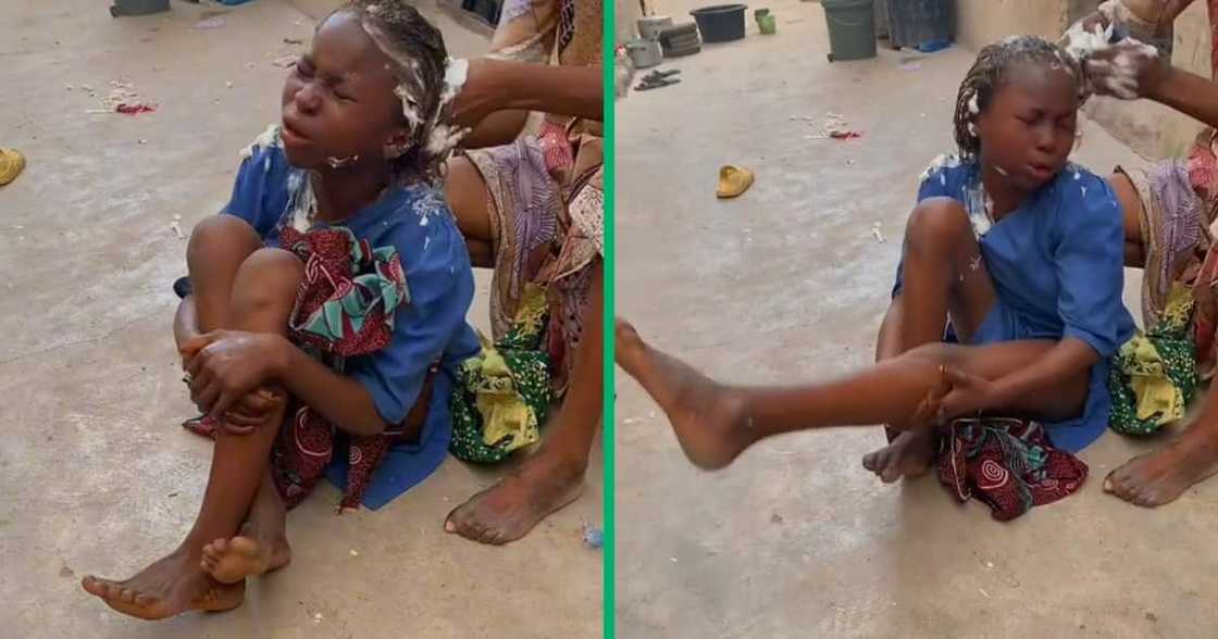 Tender headed girl getting her hair relaxed Tender headed girl getting her hair relaxed