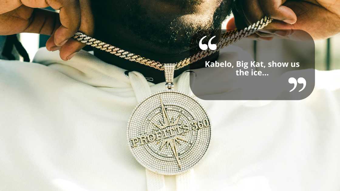 A rapper showing off his chain A rapper showing off his chain