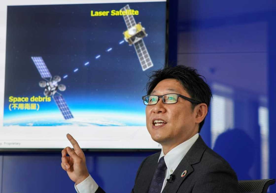 Engineer Tadanori Fukushima of satellite operator SKY Perfect JSAT envisions using a laser beam to vaporise the surface of space debris Engineer Tadanori Fukushima of satellite operator SKY Perfect JSAT envisions using a laser beam to vaporise the surface of space debris