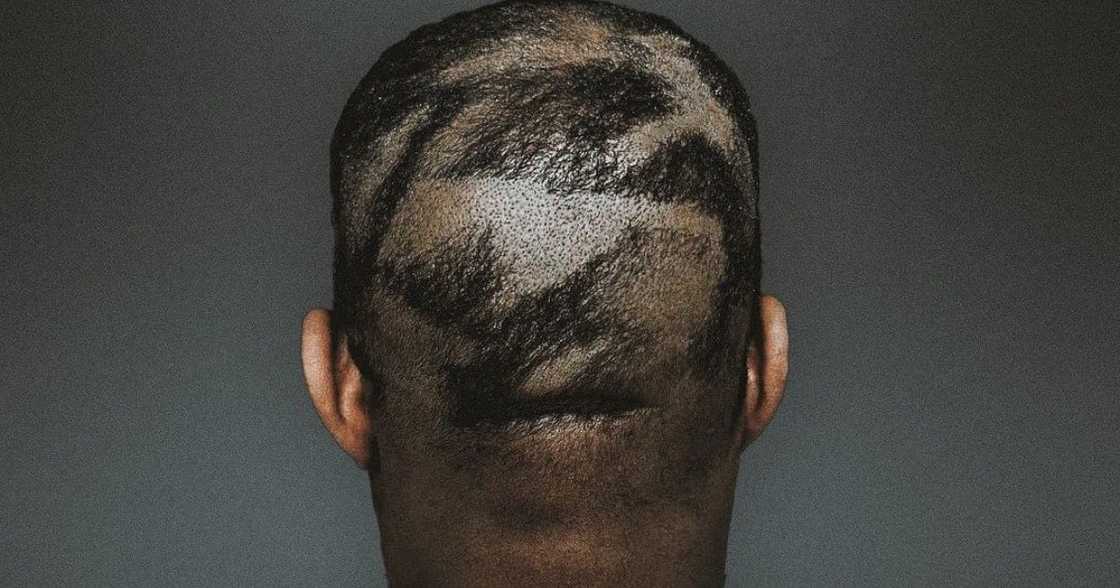 Chris Brown blasts Kanye West over his new weird hairstyle. Chris Brown blasts Kanye West over his new weird hairstyle.