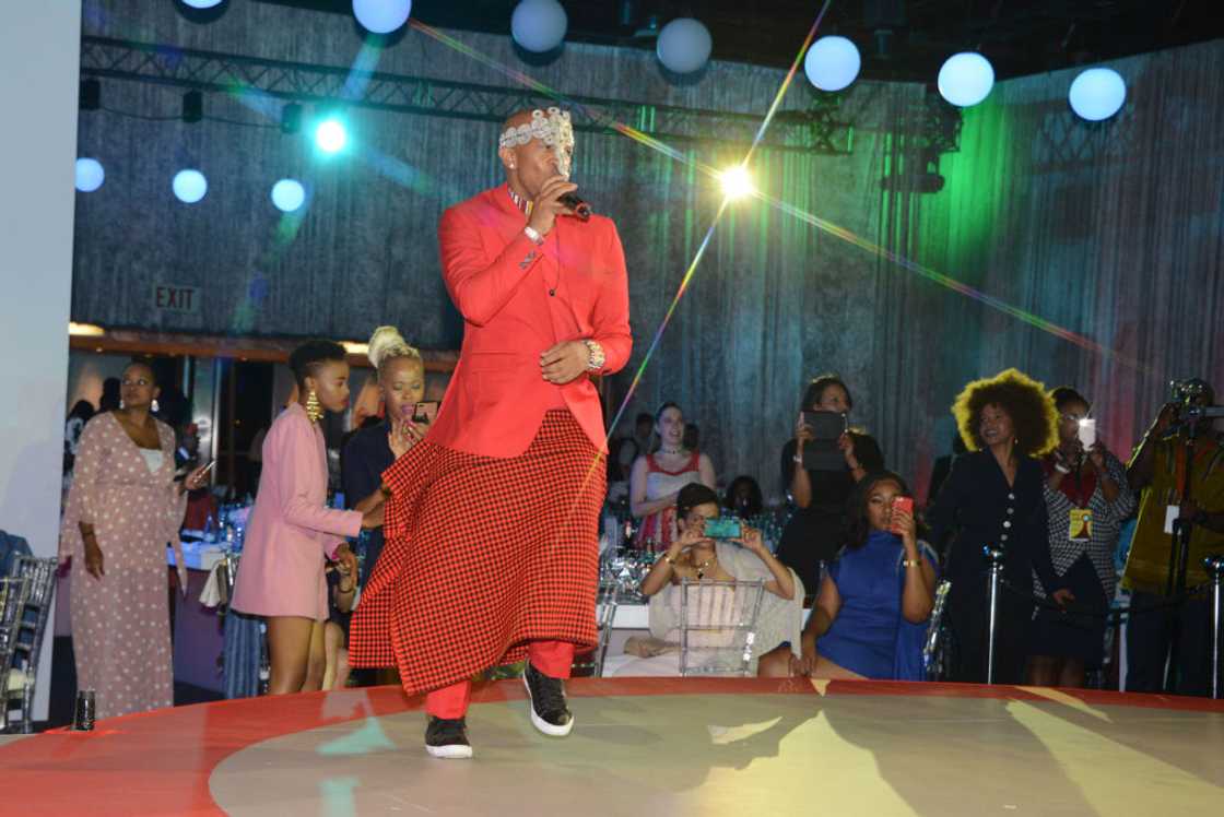 Theo Kgosinkwe perfoming on stage at the official Welcome Dinner of the Mandela 100 Global Citizen Festival Theo Kgosinkwe perfoming on stage at the official Welcome Dinner of the Mandela 100 Global Citizen Festival