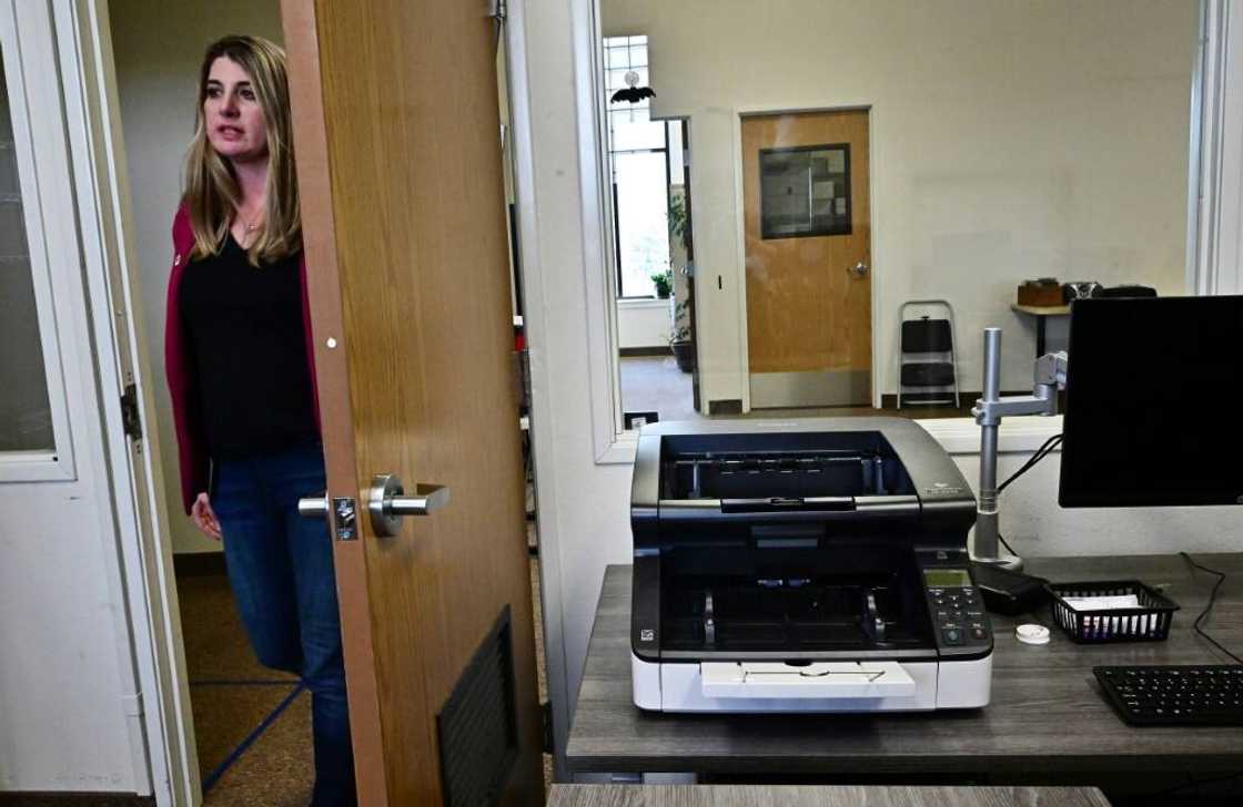 Election Registrar Joanna Francescut shows the new machines designed to count votes in Shasta County, California, on February 23, 2024 Election Registrar Joanna Francescut shows the new machines designed to count votes in Shasta County, California, on February 23, 2024
