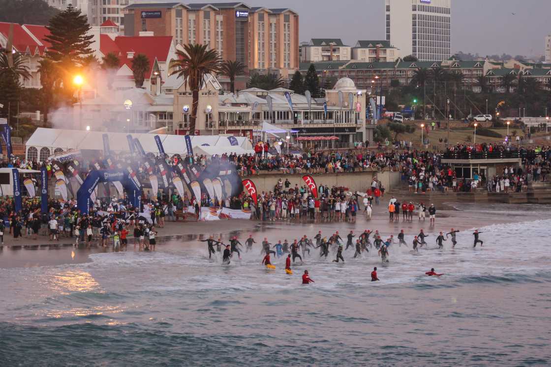 Image of Ironman Africa competitors going into the water