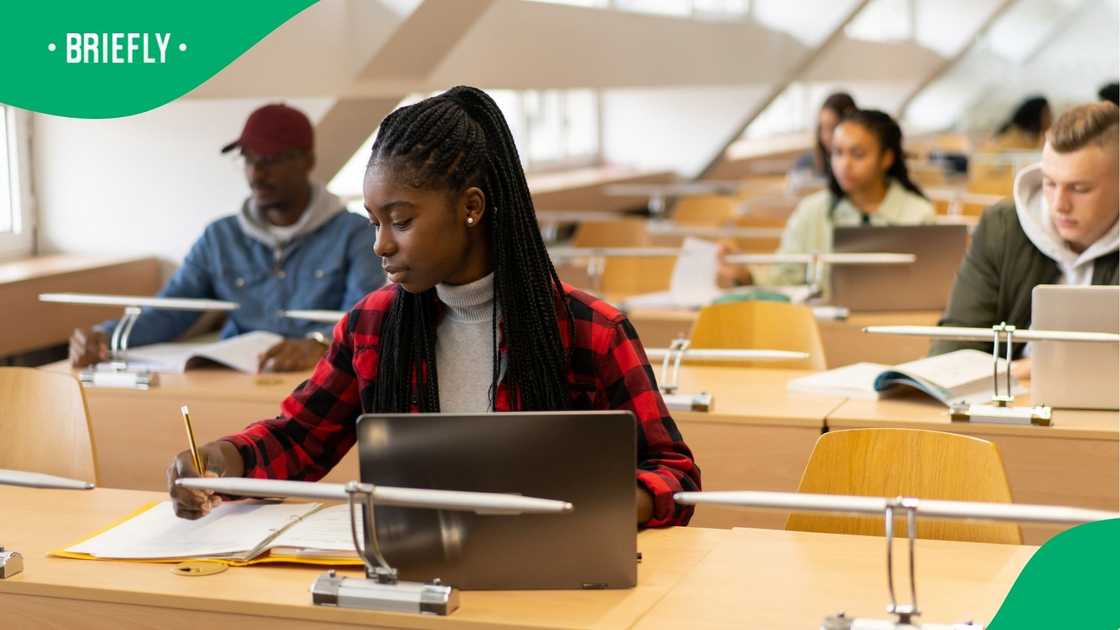 A stock image of people studying in a library