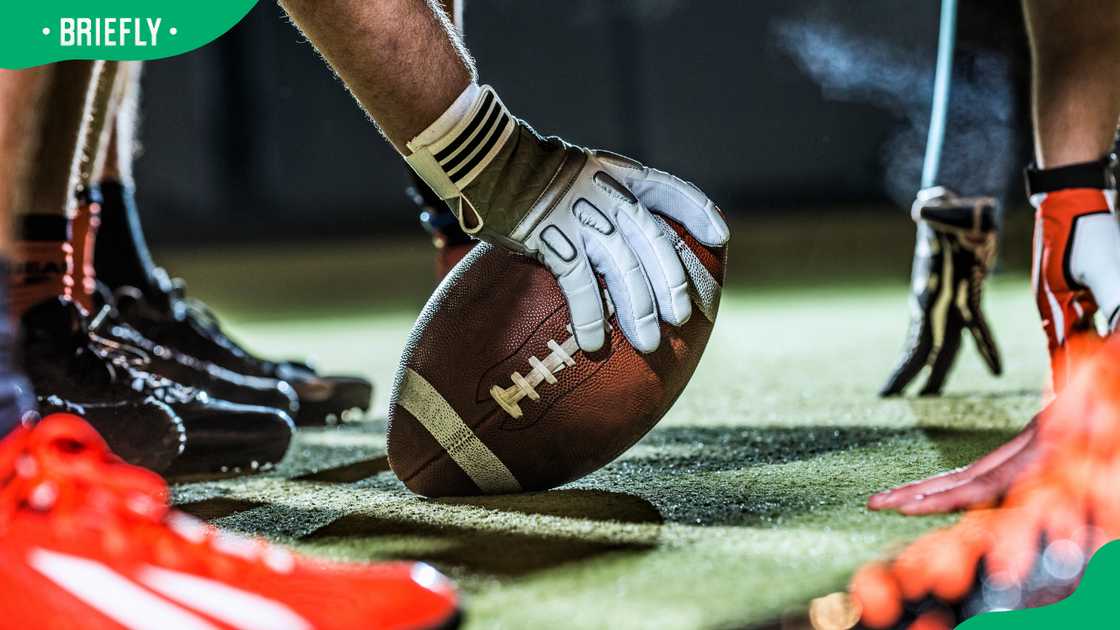 Playing American football Playing American football