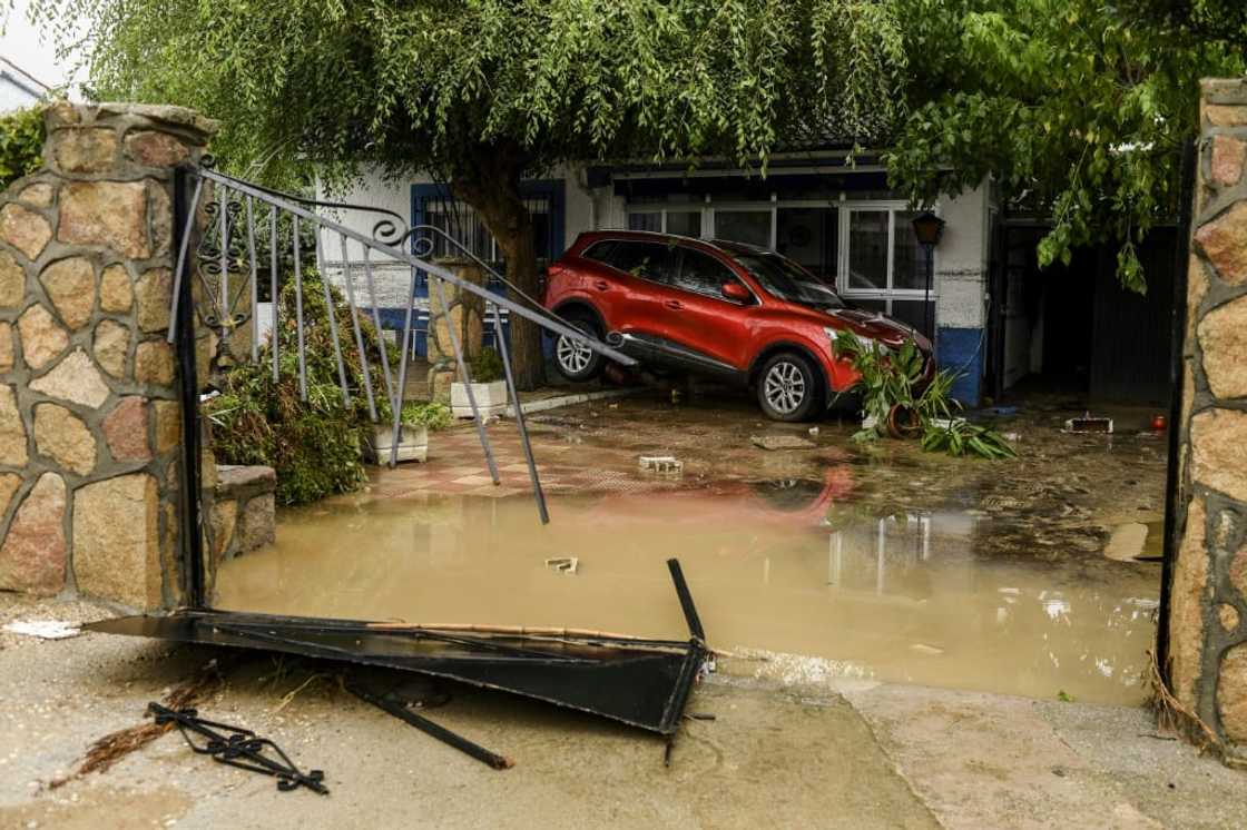 A car stranded in a garden in Aldea del Fresno, near Madrid A car stranded in a garden in Aldea del Fresno, near Madrid
