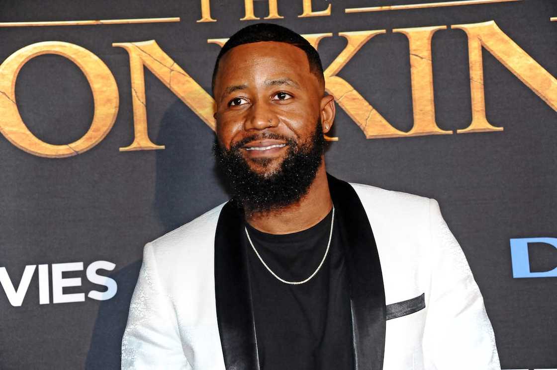 Cassper Nyovest posing for a photo at an event Cassper Nyovest posing for a photo at an event
