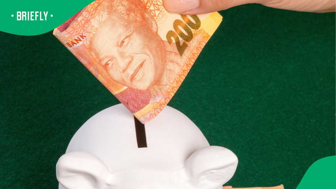 A woman saved money to eventually build a house