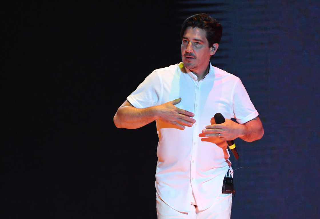 Jonathan Knight performs during a stop of the Mixtape Tour Jonathan Knight performs during a stop of the Mixtape Tour