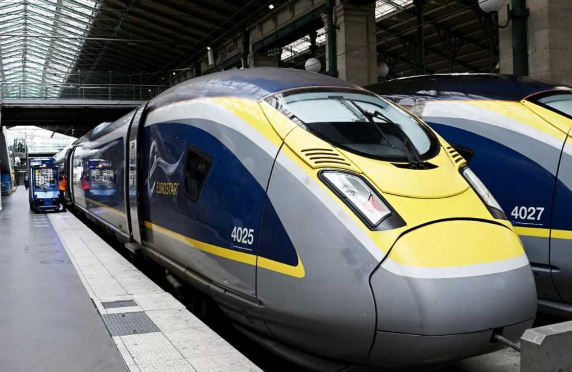 The 305-mile (492-kilometre) rail link between London and Paris opened in 1994 The 305-mile (492-kilometre) rail link between London and Paris opened in 1994
