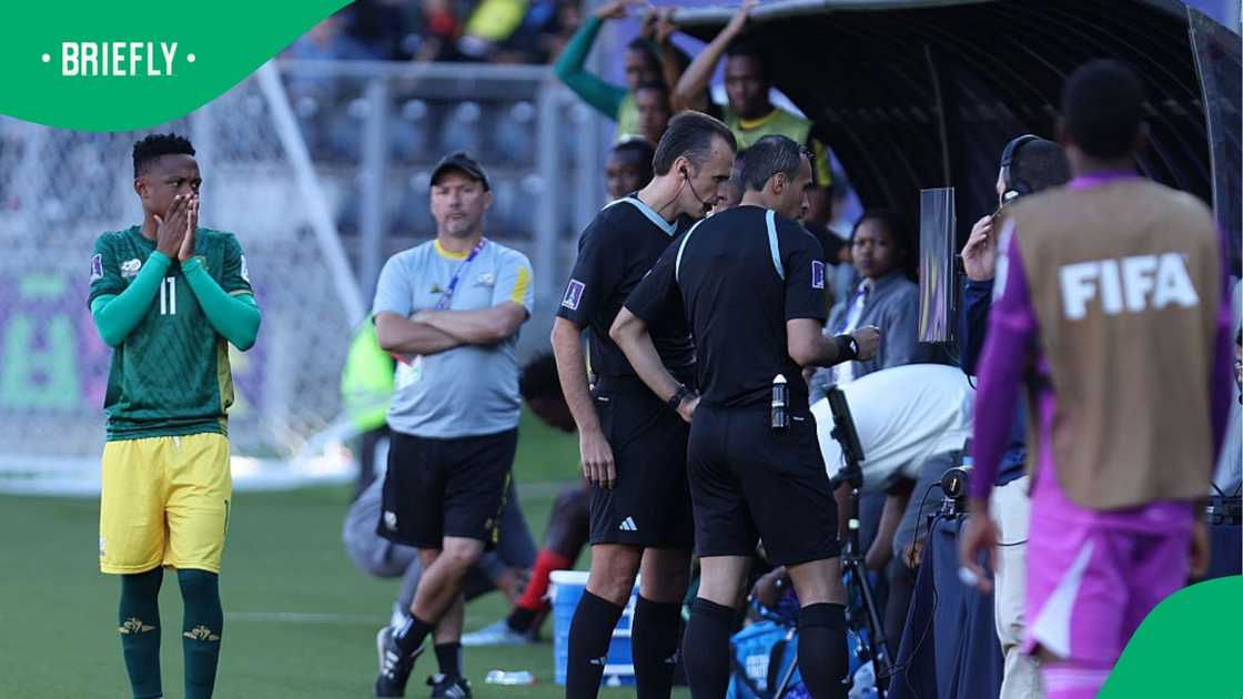 Match officials at VAR station Match officials at VAR station