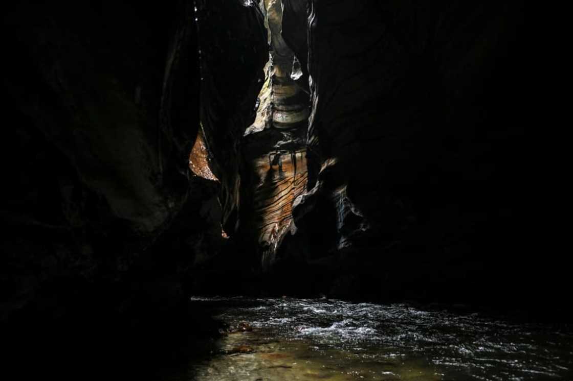 Rays of sunlight illuminate parts of the deep canyon in La Uribe Rays of sunlight illuminate parts of the deep canyon in La Uribe
