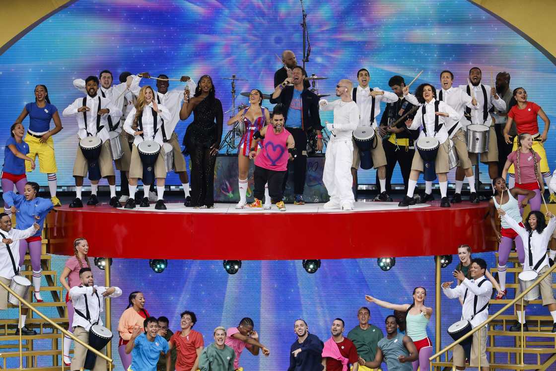 Image of Emmanuel Kelly, Chris Martin of Coldplay and J Balvin perform during the halftime show during the FIFA Club World Cup 2025 Final Image of Emmanuel Kelly, Chris Martin of Coldplay and J Balvin perform during the halftime show during the FIFA Club World Cup 2025 Final