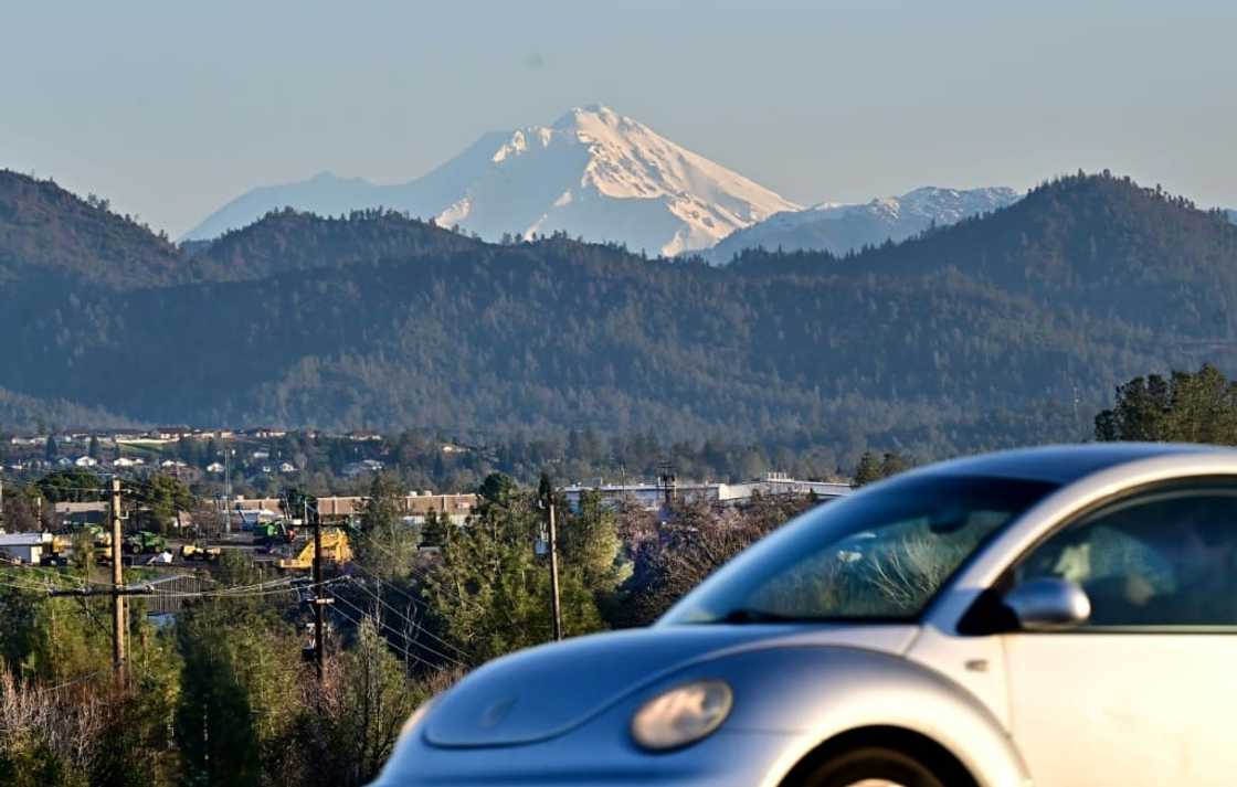 A motorist drives in Redding, a small northern California  city in the shadow of snow-covered Mount Shasta. A motorist drives in Redding, a small northern California  city in the shadow of snow-covered Mount Shasta.