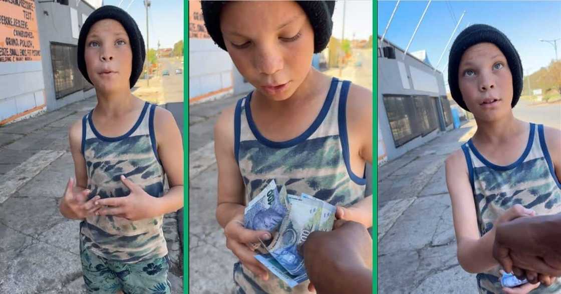 Boy receives money from BI Phakathi Boy receives money from BI Phakathi
