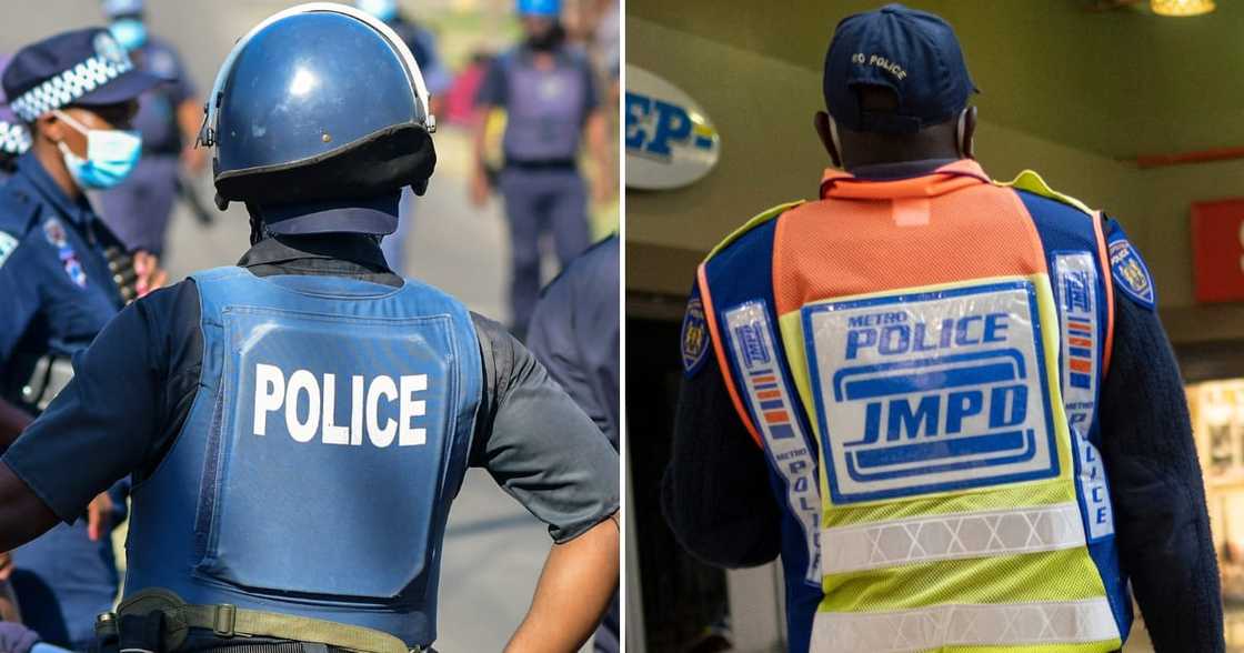 Johannesburg Metro Police Department (JMPD) officer carries his firearm while searching for looters Johannesburg Metro Police Department (JMPD) officer carries his firearm while searching for looters