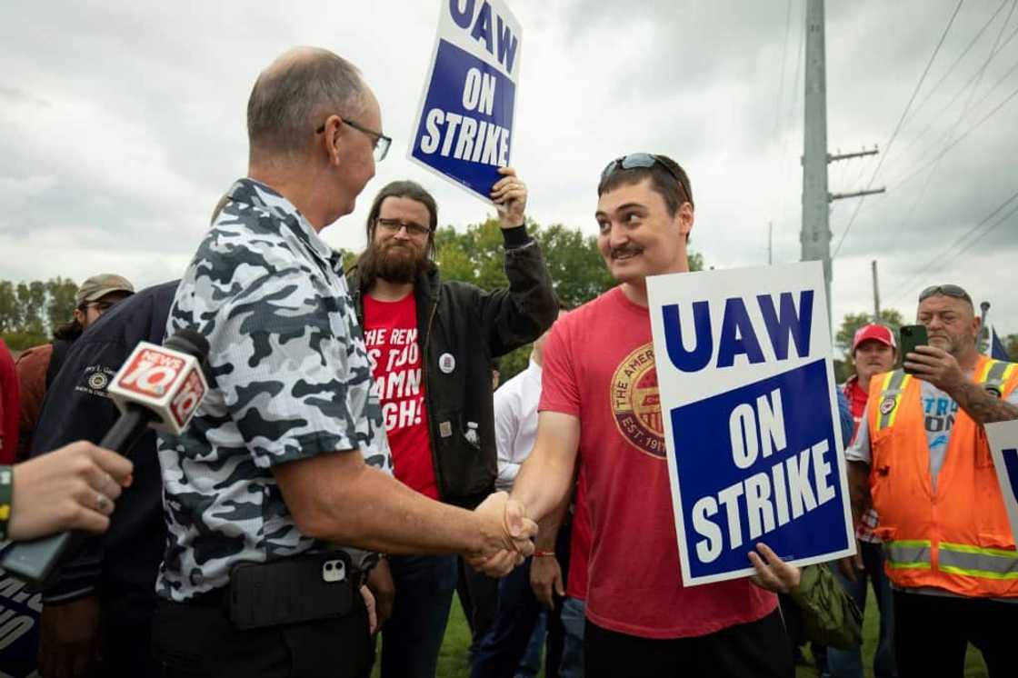 United Auto Workers President Shawn Fain greets UAW members as they strike the General Motors Lansing Delta Assembly Plant in September 2023 United Auto Workers President Shawn Fain greets UAW members as they strike the General Motors Lansing Delta Assembly Plant in September 2023