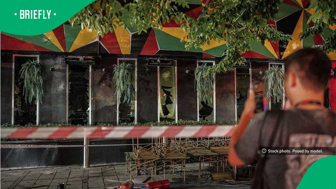 People took photos of the fire-damaged bar after a massive fire engulfed a bar in Bangkok People took photos of the fire-damaged bar after a massive fire engulfed a bar in Bangkok