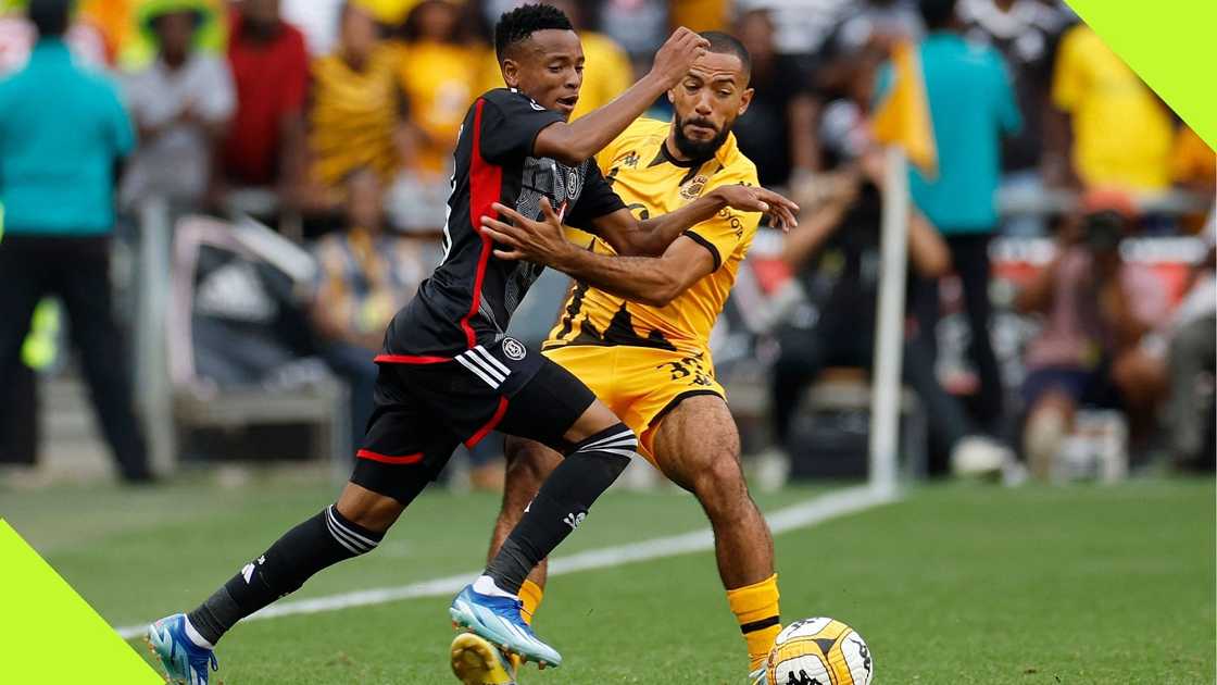 Relebohile Mofokeng fights for the ball with Reeve Frosler during the Premier Soccer League match between Kaizer Chiefs and Orlando Pirates at the FNB Stadium. Photo: Phill Magakoe.