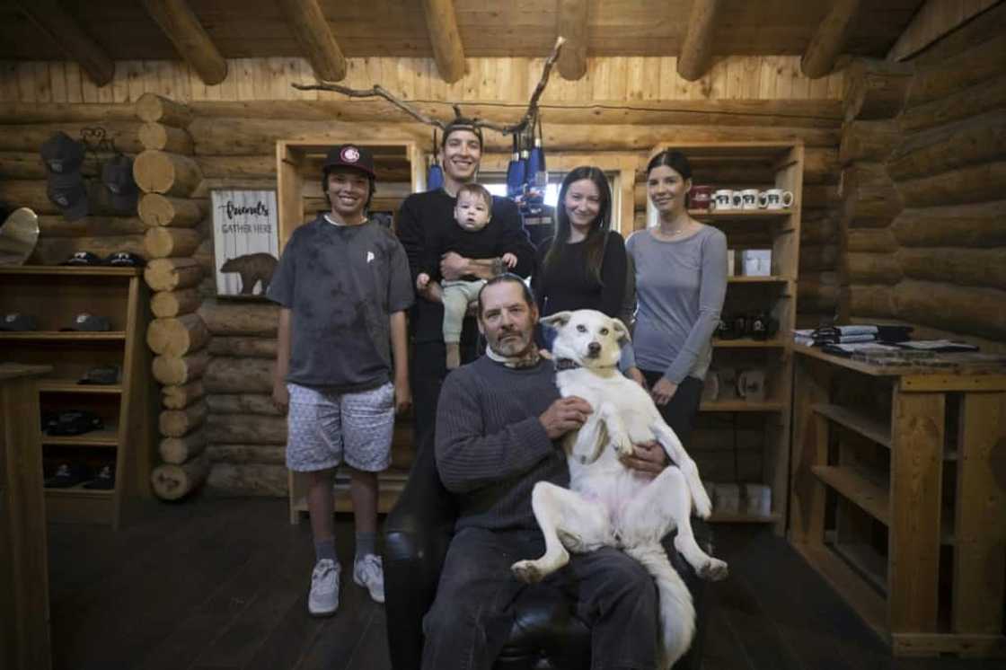Churchill resident Danielle Daley (2nd-R), who is surrounded by her family, recently saw a polar bear run past her house in July, a time of year when residents have traditionally had fewer encounters Churchill resident Danielle Daley (2nd-R), who is surrounded by her family, recently saw a polar bear run past her house in July, a time of year when residents have traditionally had fewer encounters