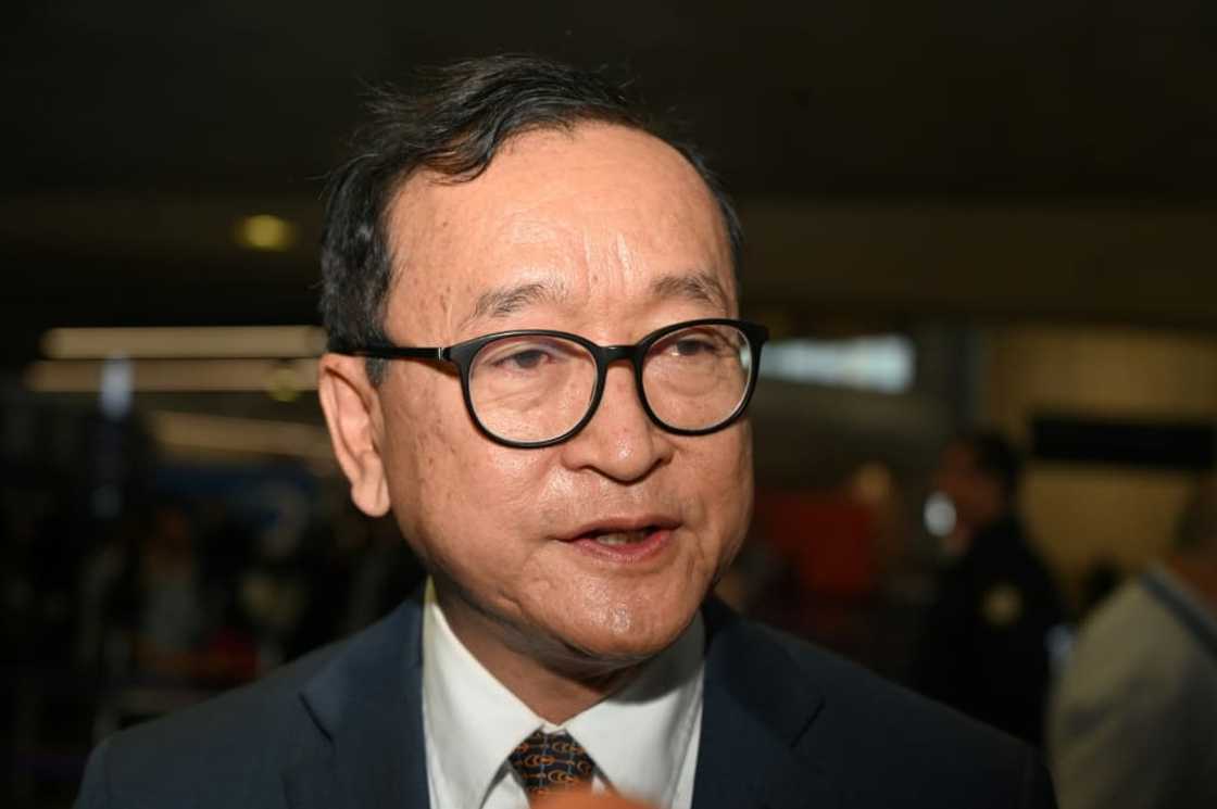 Rainsy, 73, has been targeted with two separate complaints by Cambodian Prime Minister Hun Sen and the leader's son-in-law and deputy national police chief Rainsy, 73, has been targeted with two separate complaints by Cambodian Prime Minister Hun Sen and the leader's son-in-law and deputy national police chief
