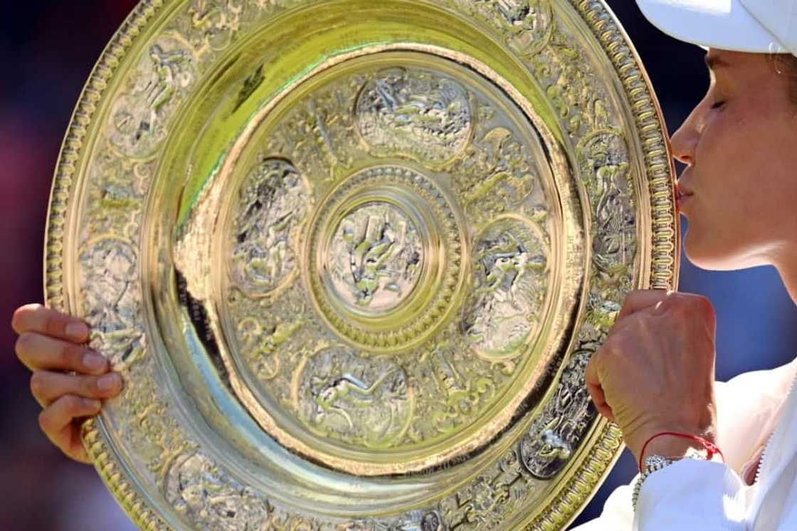 Elena Rybakina celebrates winning the Wimbledon title Elena Rybakina celebrates winning the Wimbledon title