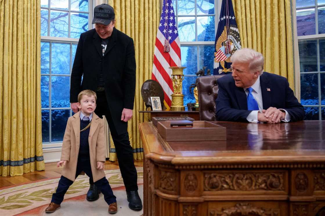 Tesla and SpaceX CEO Elon Musk, his son "X", and US President Donald Trump