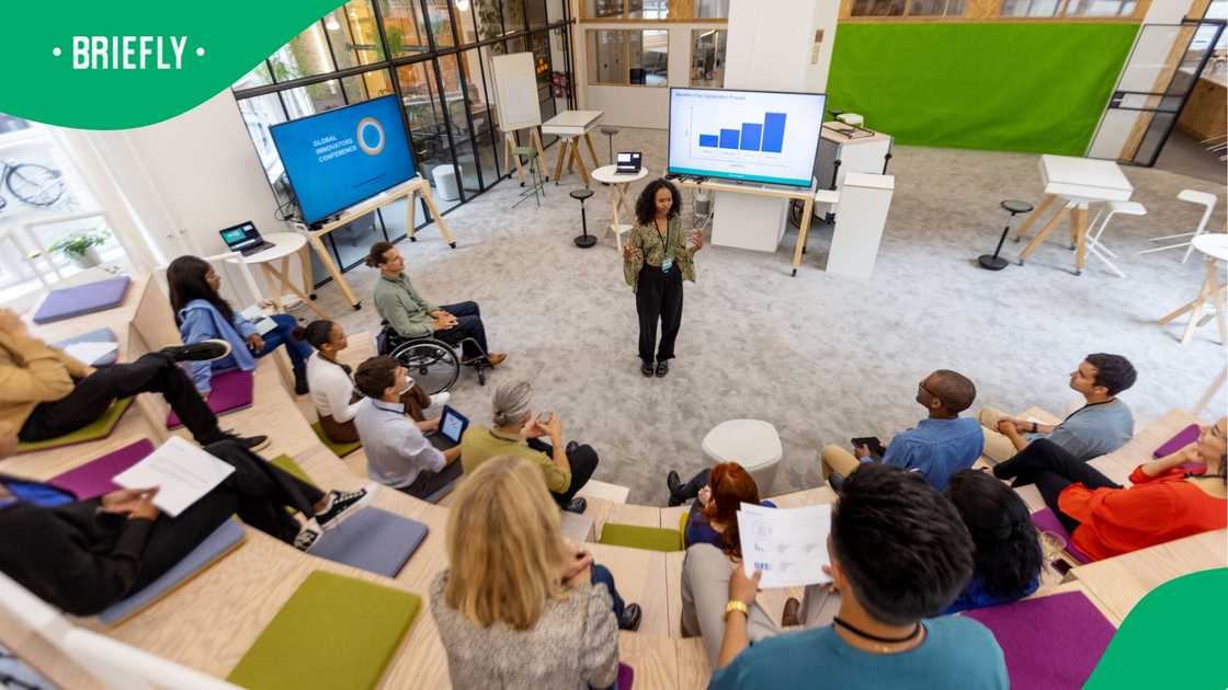 A stock image of a group of people being taught A stock image of a group of people being taught
