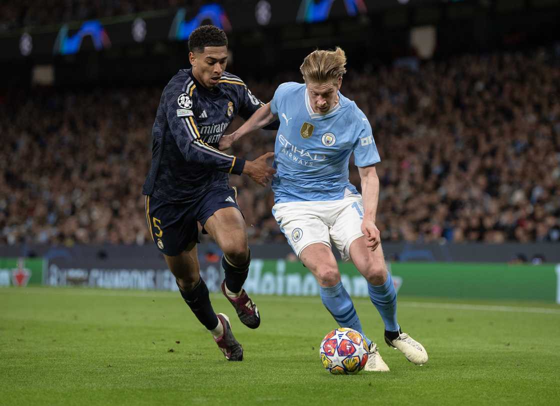 Kevin De Bruyne and Jude Bellingham during the UEFA Champions League