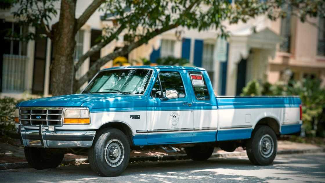 Family truck parked in front of a house Family truck parked in front of a house