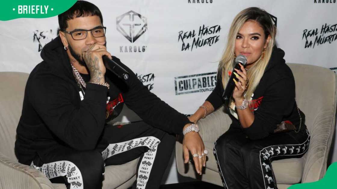 Anuel AA and Karol G during a 2019 press conference at the Mondrian Hotel in Miami Beach, Florida Anuel AA and Karol G during a 2019 press conference at the Mondrian Hotel in Miami Beach, Florida