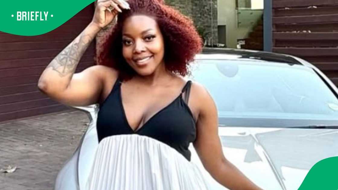 Nomcebo Zikode poses next a luxury vehicle that had fans talking Nomcebo Zikode poses next a luxury vehicle that had fans talking