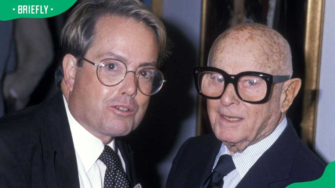 Allan Carr and Irving Swifty Lazar at the Norris Church's Art Exhibition in 1989