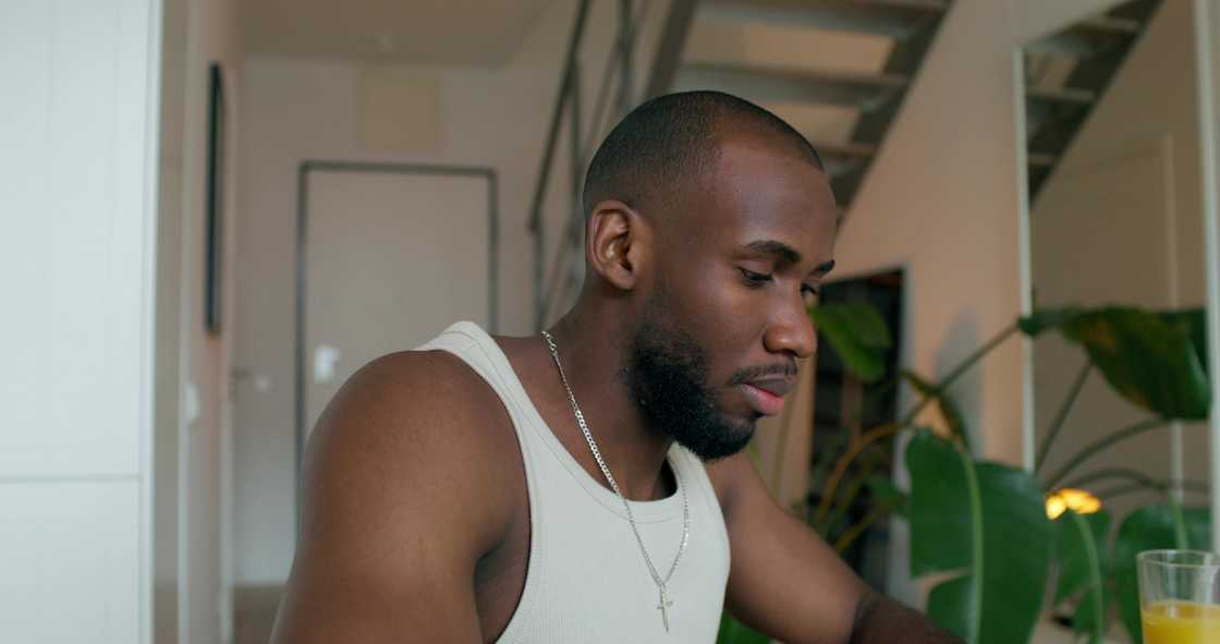 A man having juice at home A man having juice at home