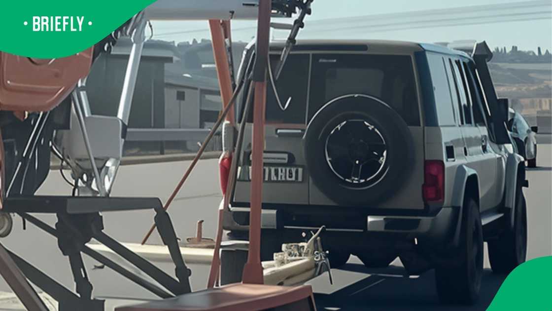 Land Cruiser driver tows helicopter Land Cruiser driver tows helicopter