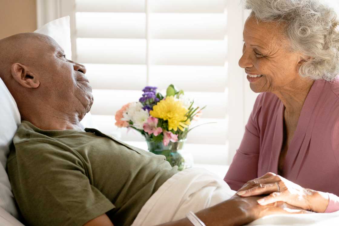 Senior woman with sick husband