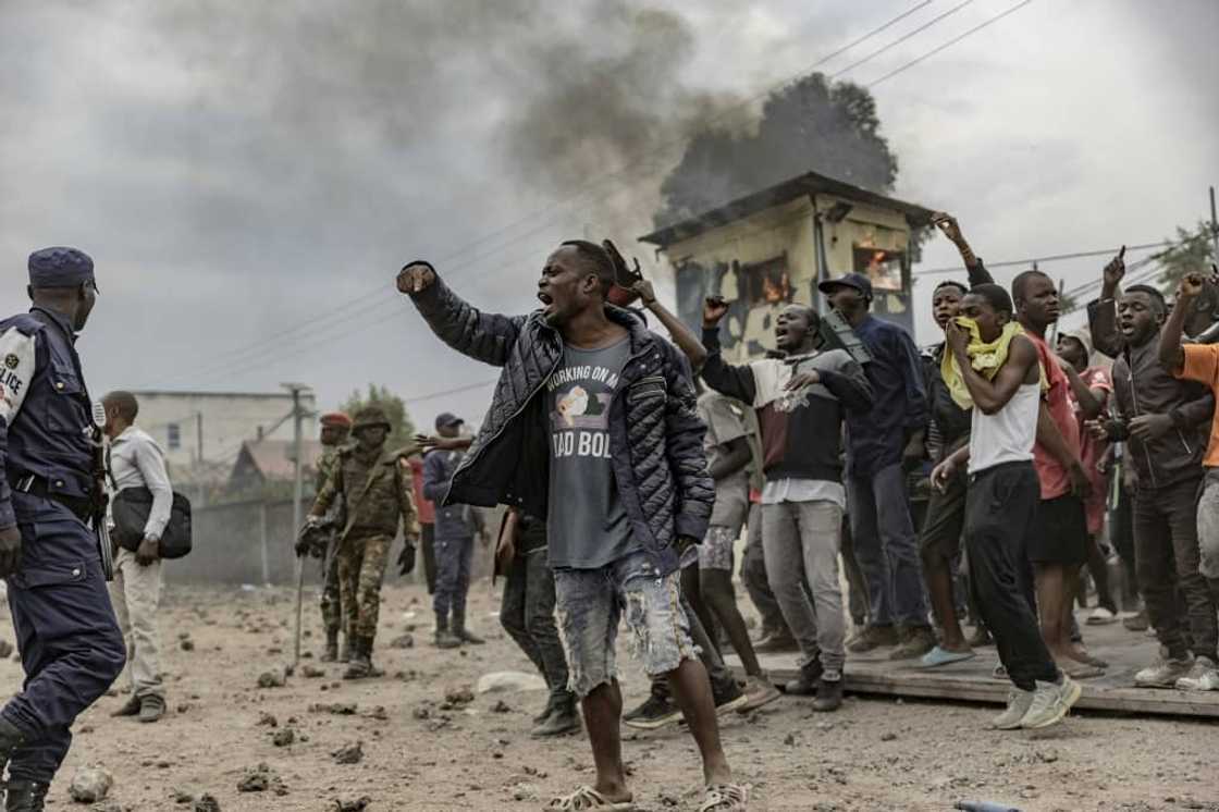 Many locals view UN peacekeepers as standing idly by while militias attack them Many locals view UN peacekeepers as standing idly by while militias attack them