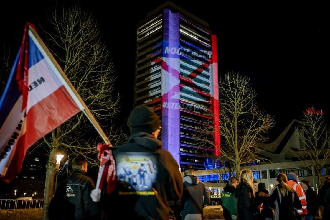Dutch farmers protested outside a leaders' debate on the eve of the election Dutch farmers protested outside a leaders' debate on the eve of the election