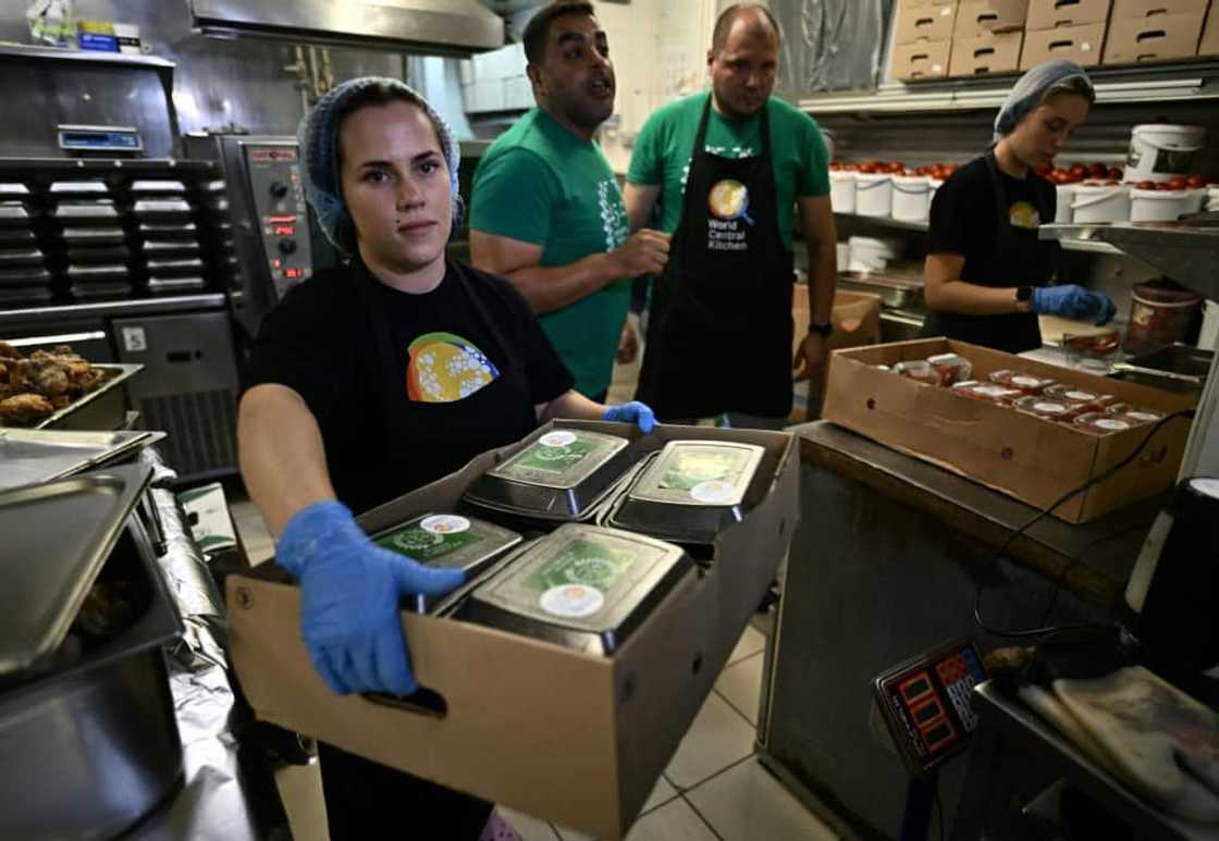 Volunteers of "World Food Kitchen" organisation prepare meals