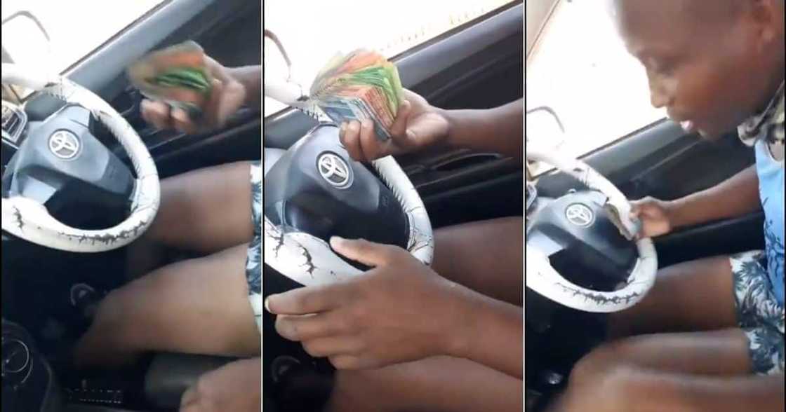 A video of a man driving while flaunting a stash of money has caught Mzansi's attention. Image: @KeletsoMSS/Twitter A video of a man driving while flaunting a stash of money has caught Mzansi's attention. Image: @KeletsoMSS/Twitter