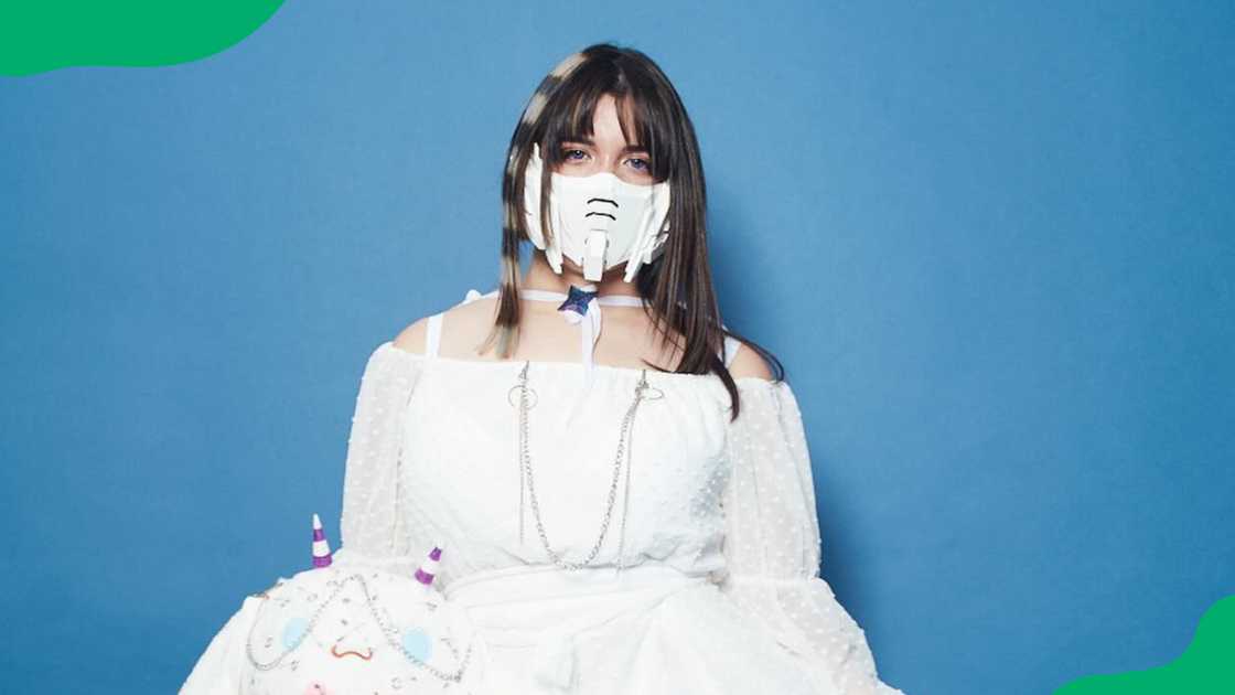 NimuVT in a white costume. NimuVT in a white costume.