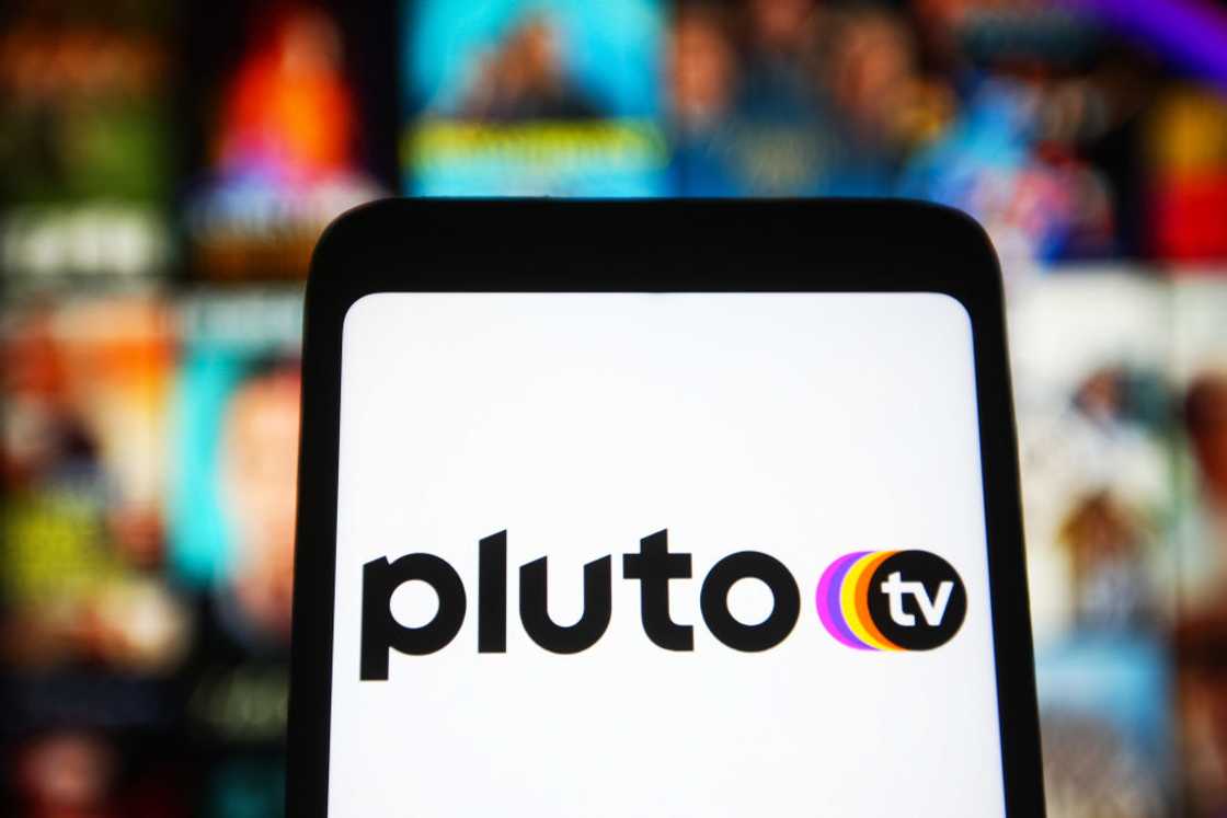 Pluto TV displayed on a smartphone screen Pluto TV displayed on a smartphone screen