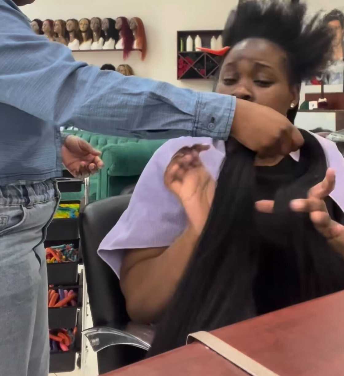 A woman refuses to help her hairdresser in a video, which sparked a buzz online. A woman refuses to help her hairdresser in a video, which sparked a buzz online.
