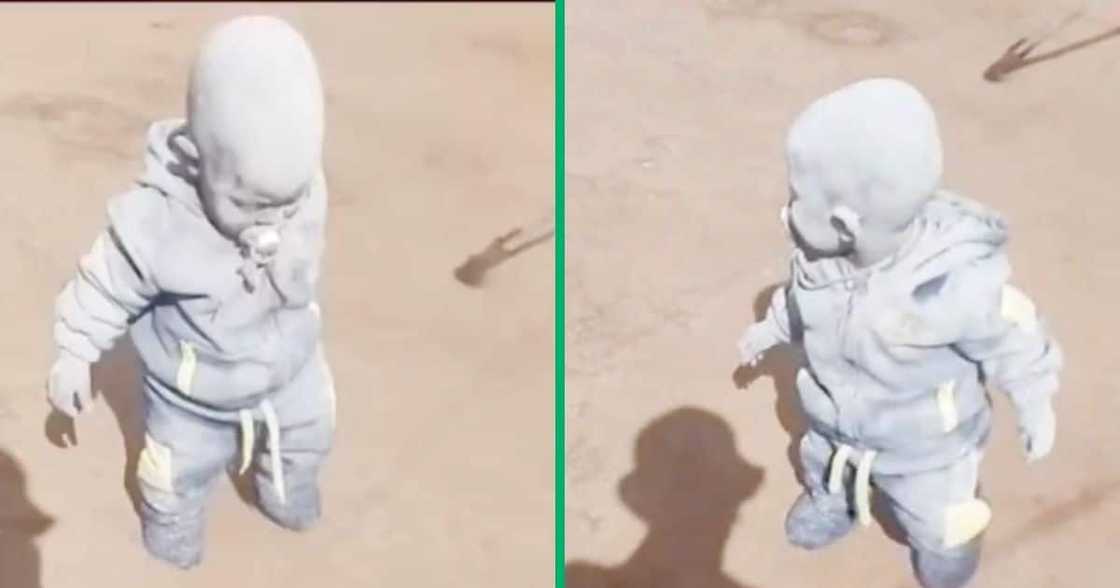 A little child was covered in cement A little child was covered in cement