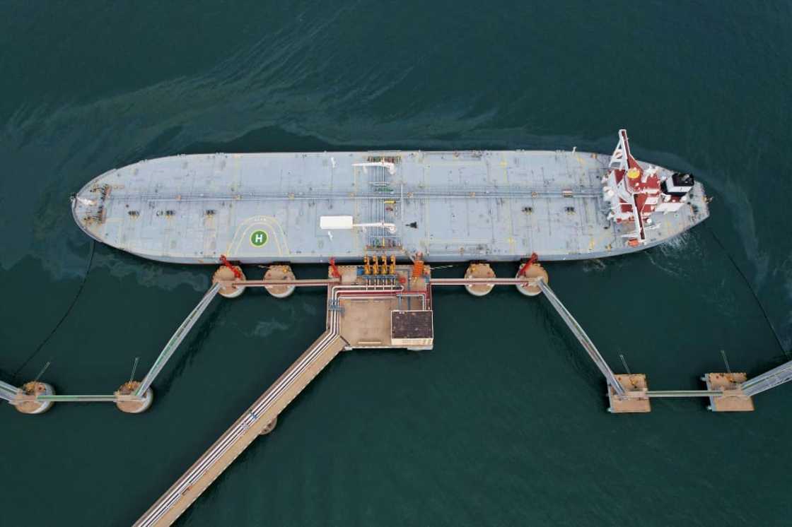 An oil tanker unloads imported crude oil at Qingdao port in China's eastern Shandong province on May 9, 2022. An oil tanker unloads imported crude oil at Qingdao port in China's eastern Shandong province on May 9, 2022.