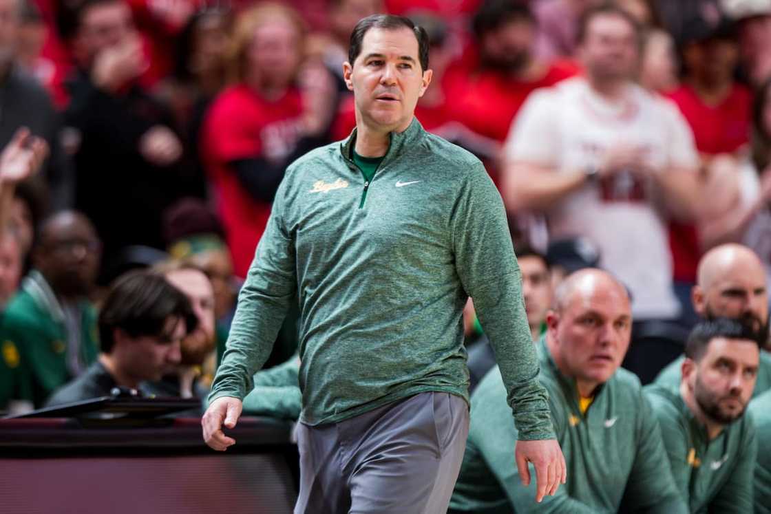 Scott Drew of the Baylor Bears walks along the sideline during a game against the Texas Tech Red Raiders Scott Drew of the Baylor Bears walks along the sideline during a game against the Texas Tech Red Raiders