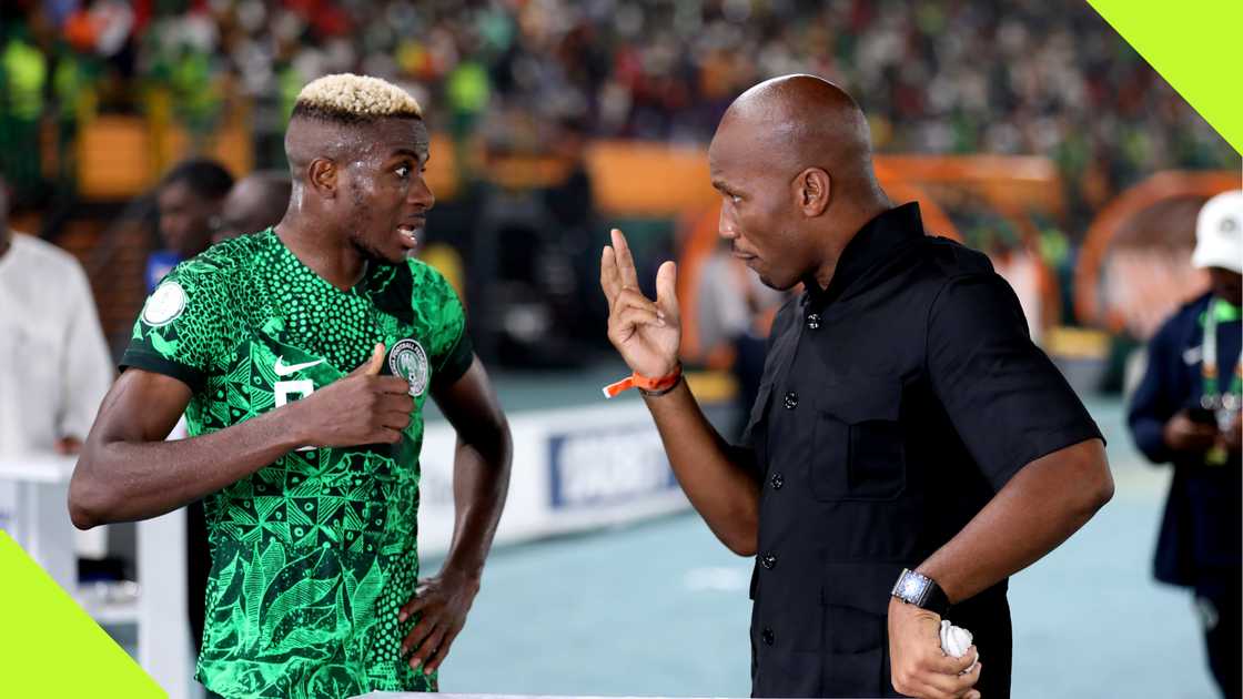 Didier Drogba and Victor Osimhen chatting during AFCON 2023.